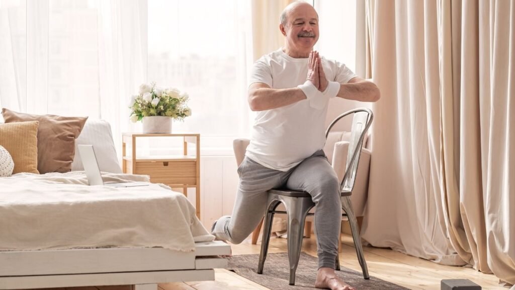 Chair Yoga: A Gentle Practice for Strength, Balance & Emotional Wellness 2 old man doing chair yoga
