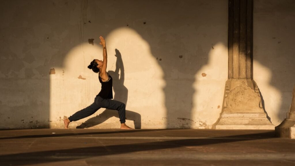 What Is a Yoga Instructor? A Complete Guide to the Role, Pathways, and Career Outlook 3 practising yoga in India
