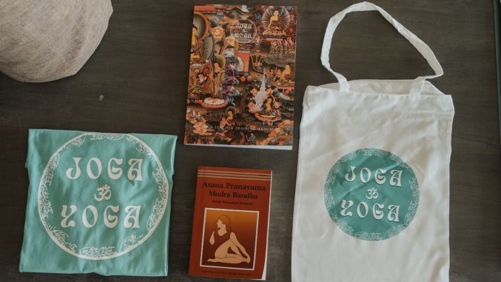 Why Summer 2025 is Your Moment for Yoga Teacher Training in Bali 1 Yoga Alliance certificate, course books, journal, and Joga Yoga t-shirt provided to students during 200-hour training in Bali