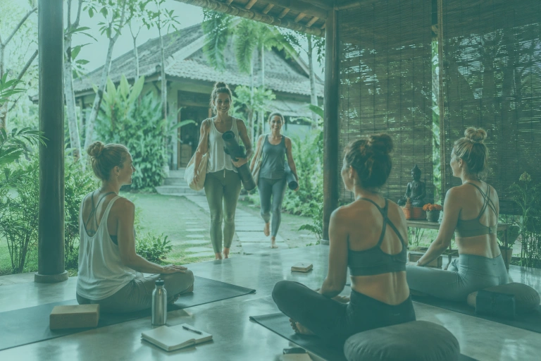 Yoga teacher training students settling into their first day at a tropical yoga shala in Canggu, Bali.